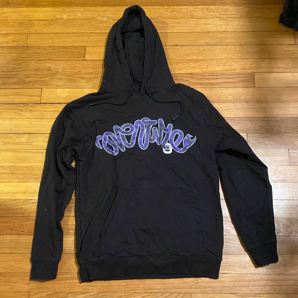 Overtime black hoodie with purple writing. Size medium.